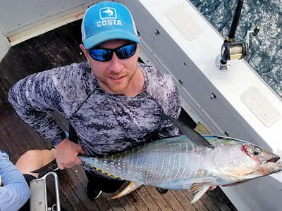 Outer Banks angler displays tuna..