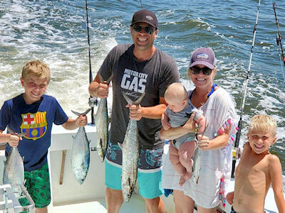 Oregon Inlet family displays catch.